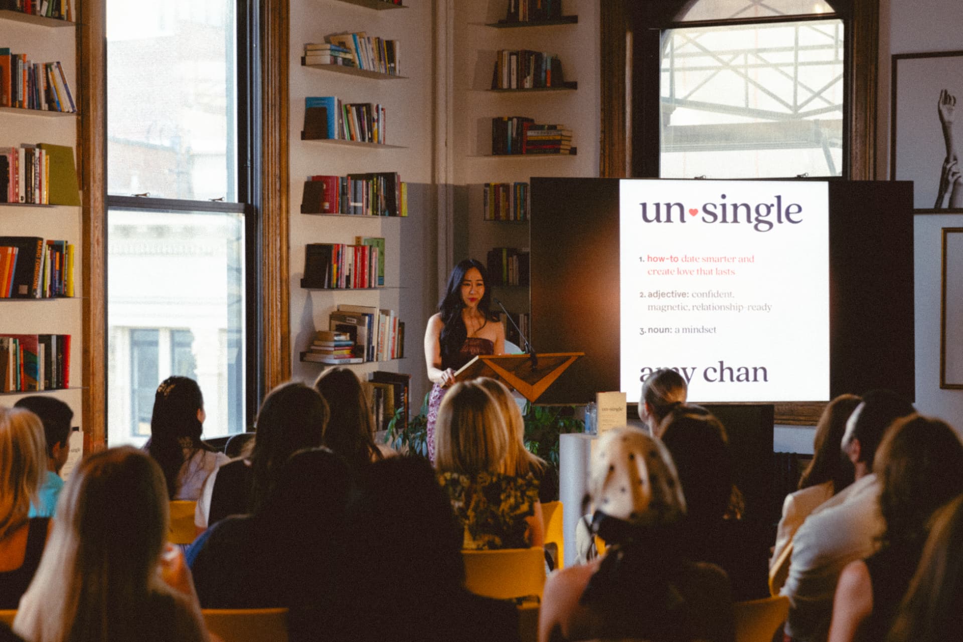 Amy Chan speaking at the UNSINGLE book launch